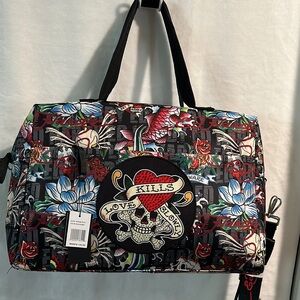 NWT Ed Hardy Weekend Traveler with Convenient Suitcase Slide and zipper closure.